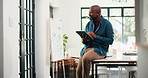 Tablet, thinking and black man in office for business, risk management data or investment decision. Smile, technology or mature analyst in company for research, chart analysis or planning for finance