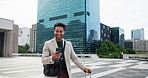 Happy, businessman and walking with phone or suitcase in city for travel, commute or destination. Man, employee or traveler with smile on mobile smartphone for online chatting, texting or app in town