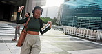 Dancing, headphones and woman in city walking to university for education or learning. Happy, books and female student with audio tech for listening to music, playlist or album with commute in town.