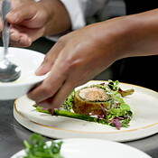 food-seasoning-and-chef-with-garnish-hands-and-culinary-skills-for