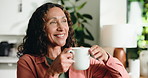 Break, coffee and thinking with happy woman in living room of home for contemplation or reflection. Beverage, relax and smile with mature person in apartment for memories, nostalgia or perspective