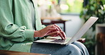 Hands, laptop and typing with person in living room of home for blogging, email or remote work. Computer, fingers and keyboard with woman in apartment for digital calendar, diary or online schedule