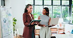 Conversation, laptop and tablet with designer people in office for internship or project management. App, computer or discussion with employee and mentor woman in workplace for feedback or review