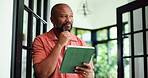 Black man, thinking or reading in home with tablet for remote work, marketing campaign and idea. Mature person, contemplating or scroll with tech in house for freelance advertising, research or plan.