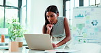 Woman, thinking and typing in office with laptop for marketing performance, data analysis or planning. Female person, reading and browsing with computer for advertising analytics, research or graphs.