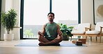 Fitness, meditation and yoga with man on floor of home for balance, inner peace or mindfulness. Exercise, relax and zen with yogi person in studio apartment for holistic health or wellness routine