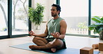 Meditation, relax and yoga with man in home studio for balance, inner peace or mindfulness. Fitness, mudra and zen with yogi person in apartment for holistic health, lotus pose or wellness routine