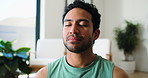 Calm, breathing and man in home for yoga, mindfulness and think of inner peace for fitness. Meditation exercise, yogi and happy person with holistic wellness, health and reflection for zen in house