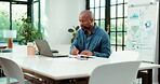 Writing, info and man with laptop, office and financial review on website, online or typing research. Corporate, business analyst and black person with tech for digital report, notes and productivity