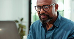 Reading, glasses or black man with laptop in startup, research market economy or review trend. Find investment opportunity, check risk factors or mature analyst with pc in office, reflection or plan