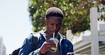 Smoothie, student and black man in city, cellphone and social media with nutrition. Outdoor, internet or African person with protein shake, vitamins or smartphone with organic juice, app or college
