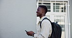 College student, man and walking with phone in city for commute, street navigation and online map. Happy, black person and smartphone outdoor for journey to university, urban travel and check route