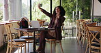 Happy woman, cafe and selfie with laptop for memory, picture or capture moment in restaurant. Female person, customer or user with smile, emoji or wave for photography or social media in coffee shop