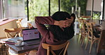 Woman, back view and relax with laptop in cafe for break, finished tasks or completion. Female person, remote work or stretching with computer for rest, done day or productivity at indoor coffee shop