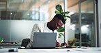 Laptop, research and writing with business black man at desk in office for accounting or finance report. Book, computer and planning with African accountant in financial workplace for audit or review