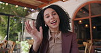 Business woman, face and wave with video call in cafe for online meeting or discussion. Portrait, female person or remote work with conversation in POV for virtual communication or webinar in shop