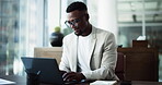 Black man, research or typing with laptop in office for investment plan, financial report or email. Business, person or reading in workplace with computer for project, budget proposal or finance info