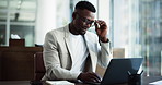 Business, black man and glasses with laptop in office for research, finance report and budget. Thinking, male person and happiness with pc for financial audit, problem solving and ideas on investment