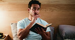 Praying, man and reading bible in bedroom, faith and Christian with belief for religion and worship. Catholic, praise and person with book for spiritual guidance, home and holy literature on bed