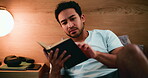 Man, praise and reading bible in bedroom, scripture and Christian with belief for religion and home. Catholic, faith and person with book for spiritual guidance, salvation and holy literature on bed