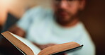 Hands, scripture and reading bible in bedroom, faith and Christian with religious guide and worship. Catholic, praise and person with book for spiritual guidance, home and holy literature on bed