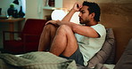 Man, frustrated and insomnia in bed, thinking or exhausted with mental health, depression or worry in home. Sad person, sleep disorder and anxiety with ptsd, grief or wake up with stress at apartment