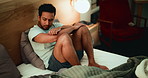 Man, stress and insomnia in bed, sad and exhausted with mental health, depression or worry in home. Person, sleep disorder and anxiety with ptsd, bad memory or wake up with fatigue at apartment