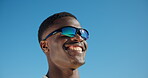 Happy, man and sunglasses for summer vacation, blue sky or think with smile on trip and mockup space. Outdoor, traveler and black person with shades for holiday, reflection and excited for break