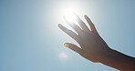 Blue sky, outdoor or hand of person with sunshine, block glare or shade eyes for protection from intense light. Vision support, uv rays or woman shield face to prevent sunburn, mockup space or flare