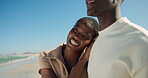 Love, woman and peaceful couple at beach with bonding together, travel adventure or romantic date. Space, happy black people and affection at seaside for healthy relationship, explore ocean and trust