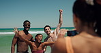 Excited, friends and picture with camera, beach and bonding on summer vacation, laughing and travel. Outdoor, photography and people with technology for memory, reunion and together on holiday or sea