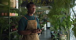 Nursery, plants and black man on tablet in store for growth, sustainability and inspection for health. Gardening, thinking and florist on digital tech for planting, inventory and agro business