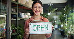 Happy, open sign and face of woman in store for sustainability, plants or greenery at small business. Board, smile and portrait of female botanist with announcement at at eco friendly nursery.