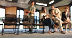 Beginning, blur and business people in conference room of office for development seminar or workshop. Getting ready, meeting and seating with employee group in workplace for start of lecture