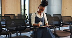 Conference room, black woman and writing with notebook for planning, speech preparation and editing. Thinking, business seminar and presenter with ideas for pitch presentation, improvement and change