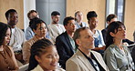 Business, seminar or people in crowd with nodding, presentation or engagement at event. Corporate, group of employees at conference with understanding, audience agreement or approval at trade show.
