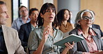 Conference, tablet and question with woman in audience of development seminar for feedback or solution. App, business and speaking with mature employee in crowd of workshop for discussion or query