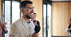 Applause, laughing and microphone with motivational speaker man in office for life coaching. Advice, crowd and speech with funny person in workplace for employee development, pep talk or support