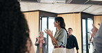 Speaker, applause and business woman at seminar for motivational speech, success or coaching event. Corporate training, public speaking and leadership program with employees clapping for announcement