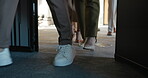 Legs, walking or group arrival at convention for global summit, career development or event. Conference, feet of people or enter doorway of auditorium for international tradeshow or corporate seminar