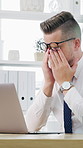 Laptop, stress and tension with business man at desk in office for burnout, eye strain or pressure. Computer, headache and typing with employee in workplace for deadline, migraine or frustration