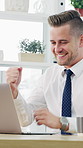 Fist pump, winning and business man on laptop for good news, stock trading bonus and success. Corporate, office and excited person with notification for investment growth, victory or financial profit