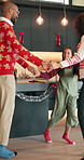 Christmas, dance and holidays with family in kitchen of home together for festive tradition. Celebration, music or rhythm with excited mother, father and daughter in apartment for December season