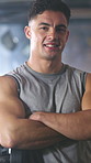 Fitness, workout and face of man in gym for strength training, health and muscles. Happy, body builder person and portrait of strong athlete with arms crossed for exercise, sports or confidence