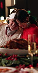 Senior father, daughter and hug at christmas dinner for bonding, holiday reunion and celebration. Happy family, flare and old man embrace woman in home for xmas lunch, festive season and appreciation