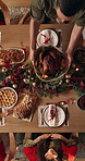 Christmas, above or people in house with serving, bonding together or clap for roast appreciation. Festive, applause or host at home with food, social gathering or celebration at holiday table.