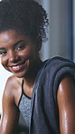 Fitness, face of woman and happy in gym for intense workout, exercise recovery and break. Athlete, african person and sweating with smile at sports club for training challenge, rest and development