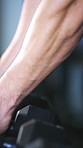 Fitness, gym and hands of man with weights to start workout, bodybuilder training and muscles. Exercise, sports center and person with dumbbells for strength, weightlifting or challenge for wellness