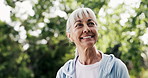 Happy, thinking and senior woman in park for fresh air, wellness and active for health. Outdoor, morning and elderly person in nature for exercise, fitness and workout for wellbeing, rest and calm