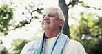 Breathe, happy and senior man in park for fresh air, wellness and active hobby for health. Outdoor, smile and elderly person in nature for exercise, fitness and workout for wellbeing, rest and calm